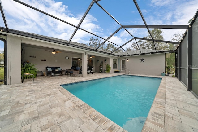 16386 Heron Hills Dr, Spring Hill, FL 34610 - outdoor pool with a lanai, a patio, ceiling fan, and an outdoor hangout area