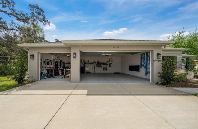 16386 Heron Hills Dr, Spring Hill, FL 34610 - garage featuring driveway