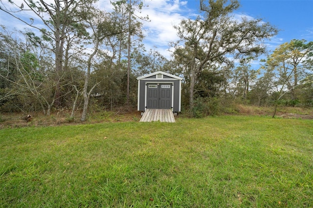 16386 Heron Hills Dr, Spring Hill, FL 34610 - view of yard with an outdoor structure and a storage shed