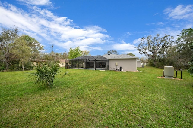 16386 Heron Hills Dr, Spring Hill, FL 34610 - view of yard with a lanai