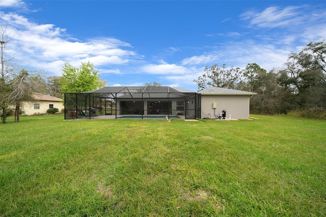 16386 Heron Hills Dr, Spring Hill, FL 34610 - back of property with a lawn, a lanai, an outdoor pool, and stucco siding