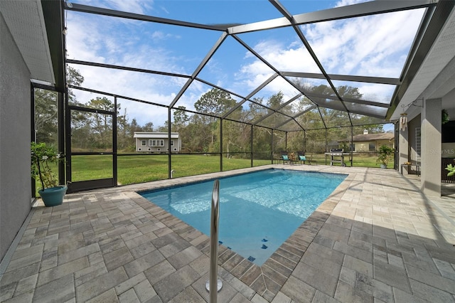 16386 Heron Hills Dr, Spring Hill, FL 34610 - pool with a lanai, a yard, a grill, and a patio