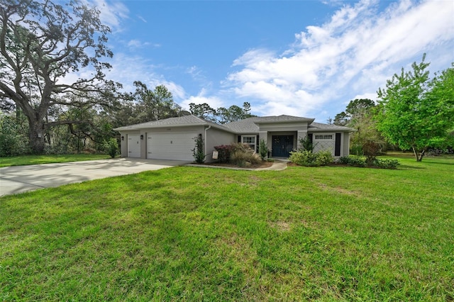16386 Heron Hills Dr, Spring Hill, FL 34610 - view of front facade with a garage, stucco siding, a front yard, and concrete driveway