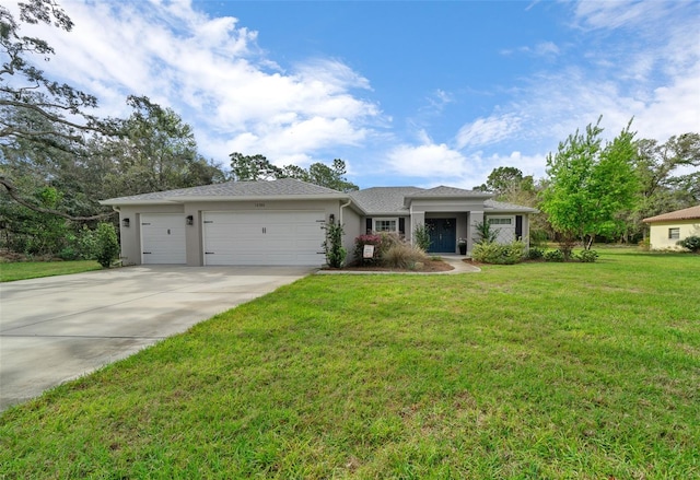 16386 Heron Hills Dr, Spring Hill, FL 34610 - single story home with stucco siding, concrete driveway, a front lawn, and a garage