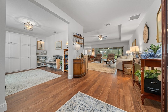 16386 Heron Hills Dr, Spring Hill, FL 34610 - foyer entrance with wood finished floors, visible vents, and ceiling fan