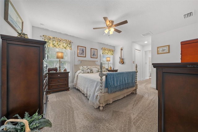 16386 Heron Hills Dr, Spring Hill, FL 34610 - bedroom with baseboards, visible vents, and light colored carpet