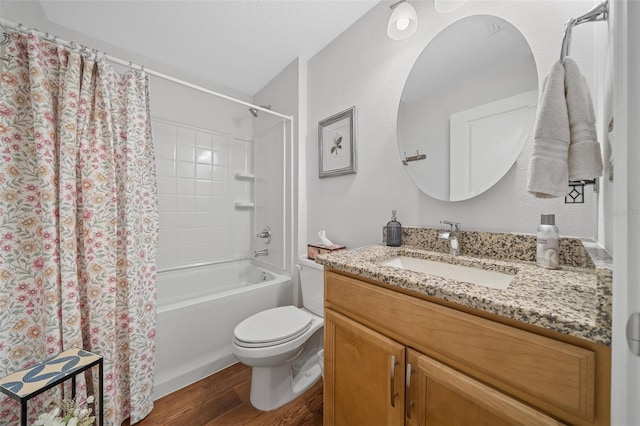 16386 Heron Hills Dr, Spring Hill, FL 34610 - full bathroom with shower / tub combo, toilet, vanity, and wood finished floors