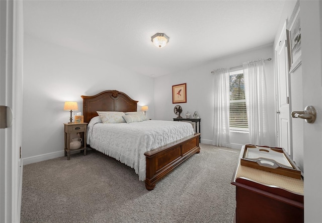 16386 Heron Hills Dr, Spring Hill, FL 34610 - bedroom featuring baseboards and light carpet