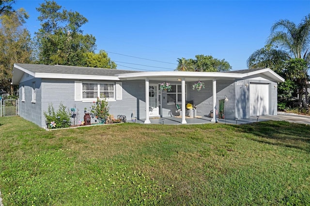 view of front facade with a front yard and a garage