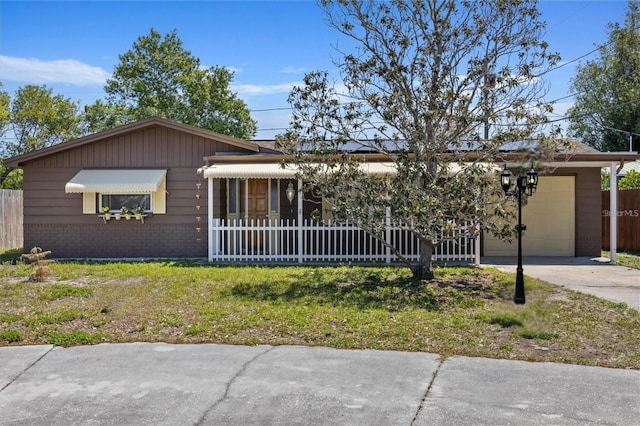 3728 Linkwood St, New Port Richey, FL 34652 - single story home with brick siding, concrete driveway, and an attached garage