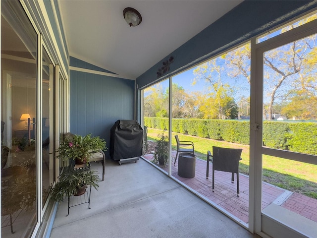 sunroom / solarium with vaulted ceiling