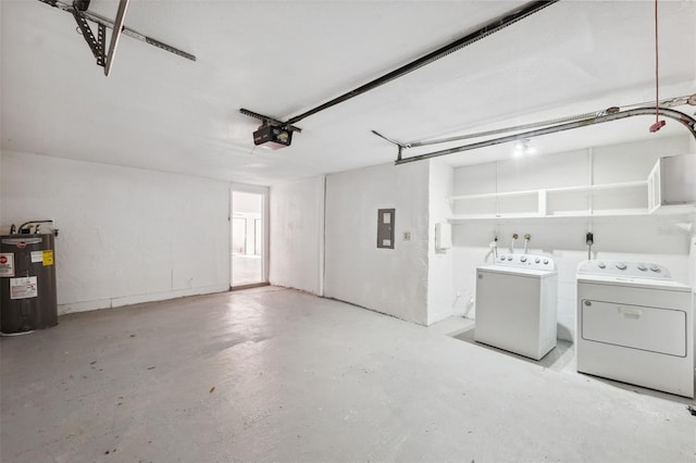 garage featuring electric panel, a garage door opener, separate washer and dryer, and water heater