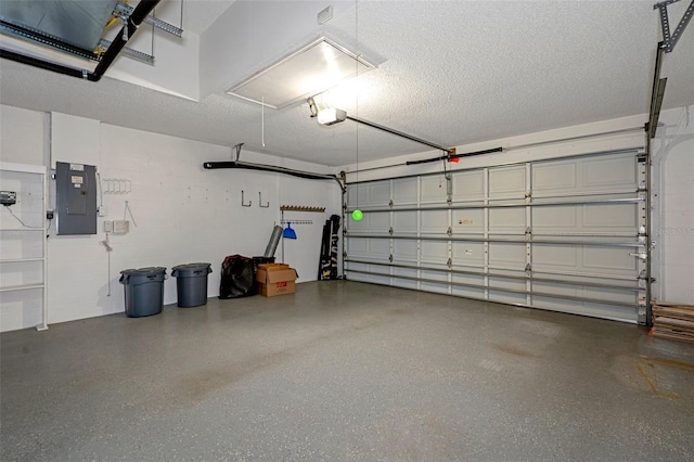 garage featuring electric panel and a garage door opener