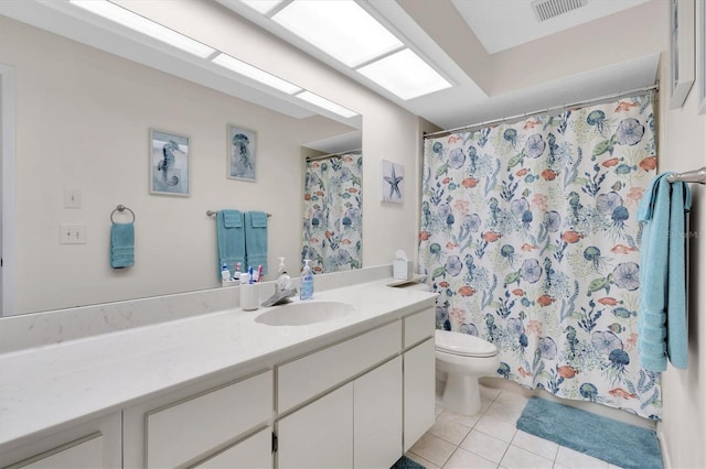 full bath with visible vents, curtained shower, toilet, tile patterned floors, and vanity