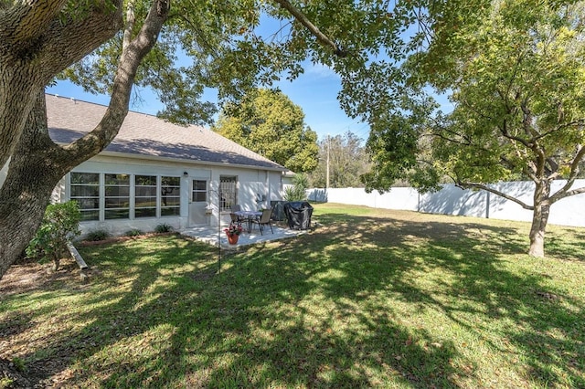 view of yard with a patio area and fence