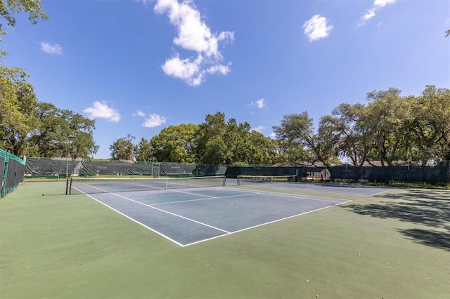 view of sport court with community basketball court and fence