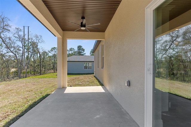 view of patio with ceiling fan