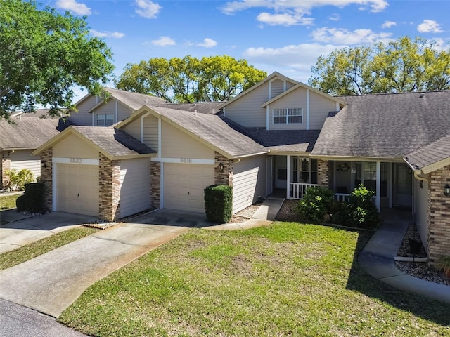 view of front facade featuring driveway, roof with shingles, a porch, a front lawn, and a garage