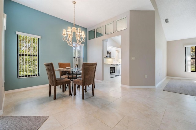 dining room with high vaulted ceiling, visible vents, baseboards, and a chandelier