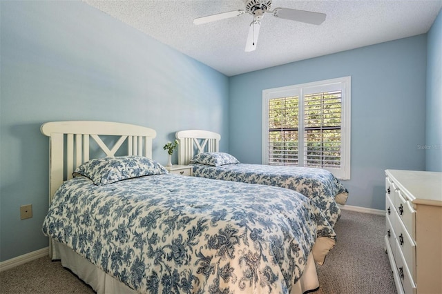 bedroom with baseboards, carpet floors, a textured ceiling, and ceiling fan