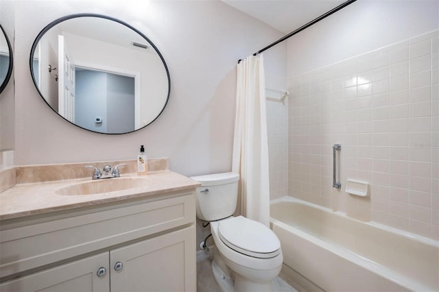 full bathroom with toilet, vanity, and shower / bath combo