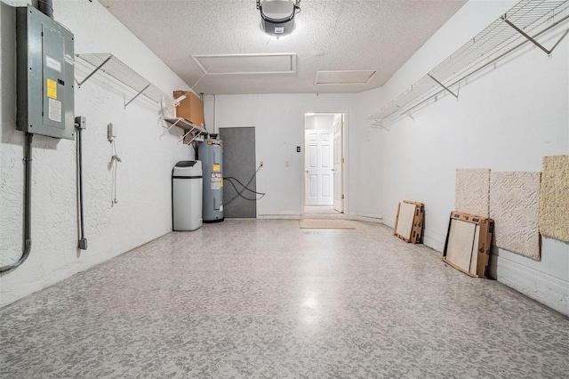 garage featuring electric panel, a garage door opener, and electric water heater