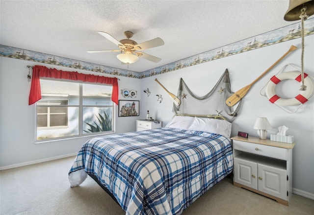 bedroom with baseboards, a textured ceiling, and carpet