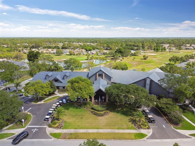 aerial view featuring golf course view and a water view