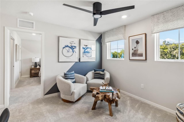 sitting room with visible vents, baseboards, carpet, recessed lighting, and a ceiling fan