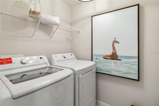 laundry room featuring laundry area and washing machine and dryer