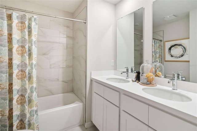 bathroom with double vanity, shower / tub combo with curtain, and a sink