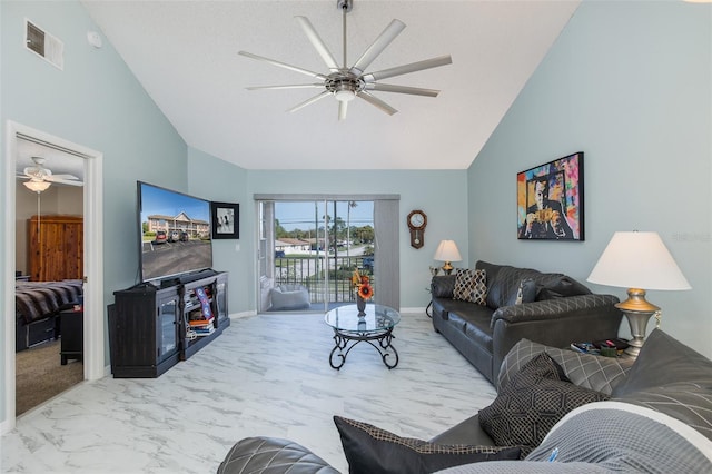 living room with visible vents, high vaulted ceiling, marble finish floor, and ceiling fan