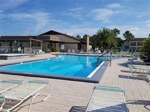 pool featuring a patio area