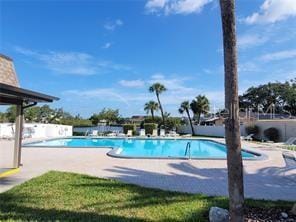 community pool with a patio