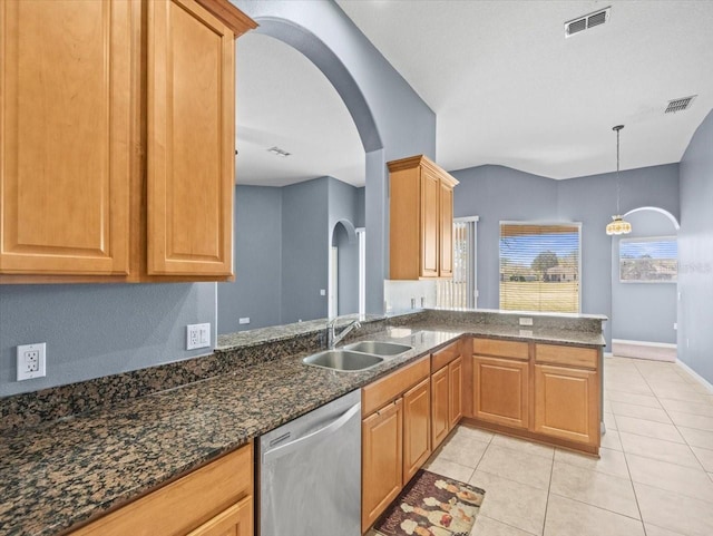 kitchen with a sink, visible vents, arched walkways, and stainless steel dishwasher