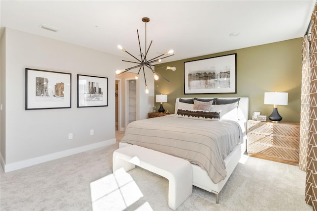 carpeted bedroom with visible vents, baseboards, and an inviting chandelier