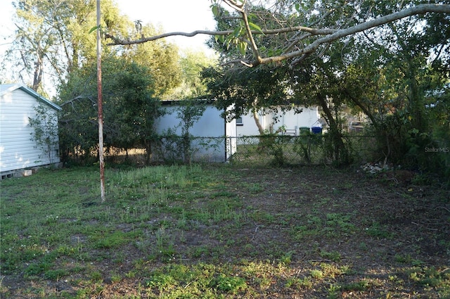 view of yard with fence