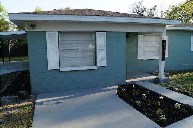 exterior space featuring concrete block siding