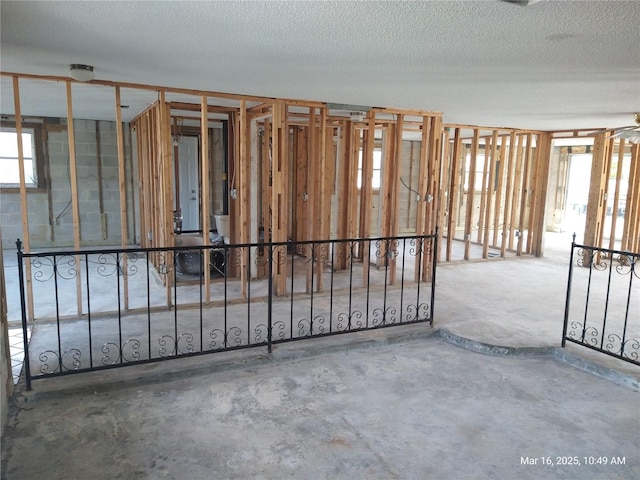 misc room with a textured ceiling