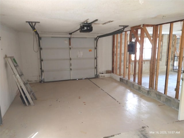 garage featuring a garage door opener