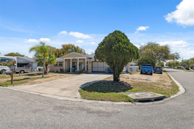 view of front facade featuring an attached garage and driveway