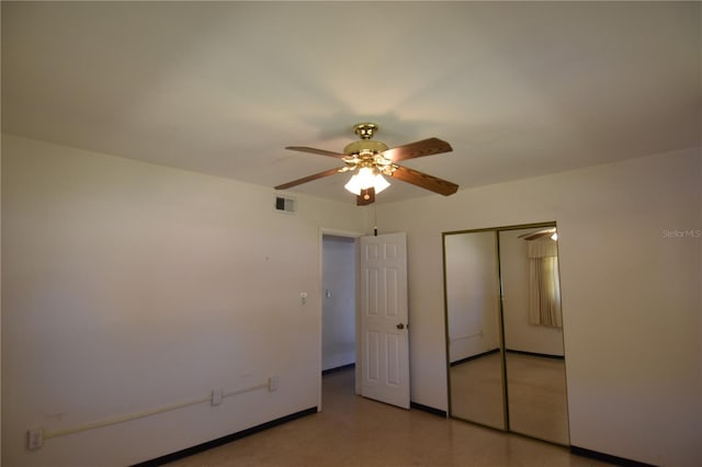 unfurnished bedroom with baseboards, visible vents, a closet, and ceiling fan