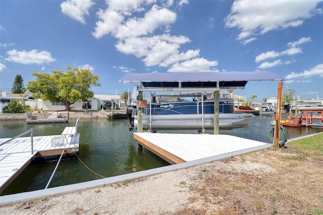 dock area featuring a water view and boat lift