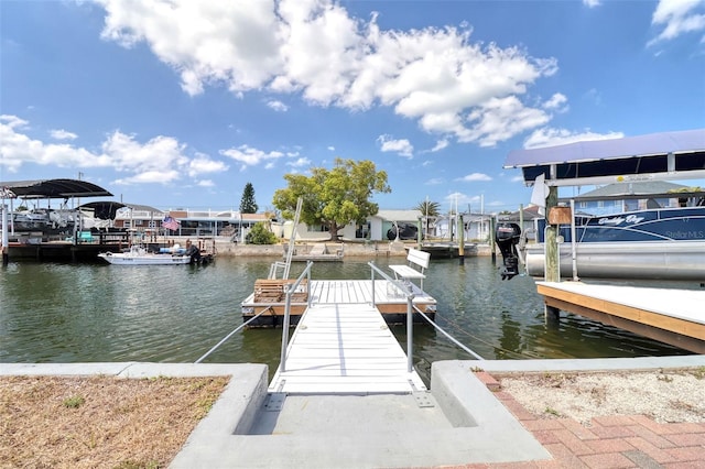 dock area with a water view