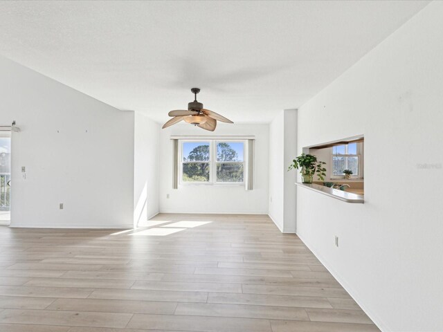 5557 Sea Forest Dr Unit 318, New Port Richey, FL 34652 - interior space featuring ceiling fan and light wood-style floors