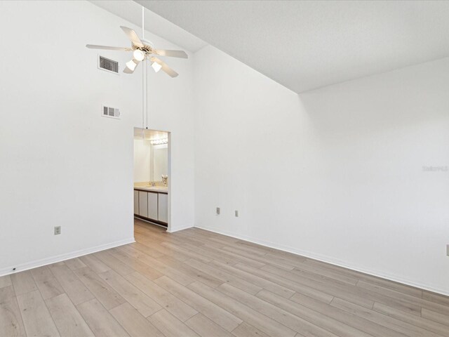 5557 Sea Forest Dr Unit 318, New Port Richey, FL 34652 - spare room with a ceiling fan, baseboards, light wood-style flooring, and visible vents