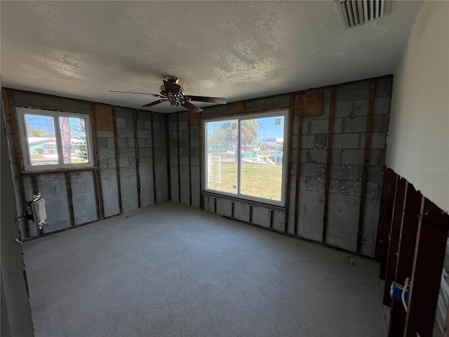 13930 Berkowitz Ave, Hudson, FL 34667 - carpeted spare room with ceiling fan