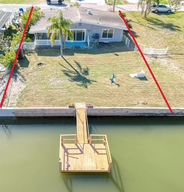 13930 Berkowitz Ave, Hudson, FL 34667 - exterior space with a water view, stucco siding, and a yard