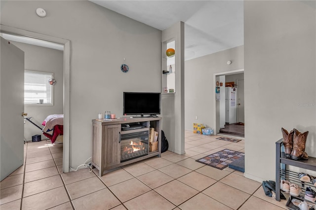 living area featuring light tile patterned floors