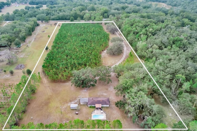 drone / aerial view with a rural view and a forest view